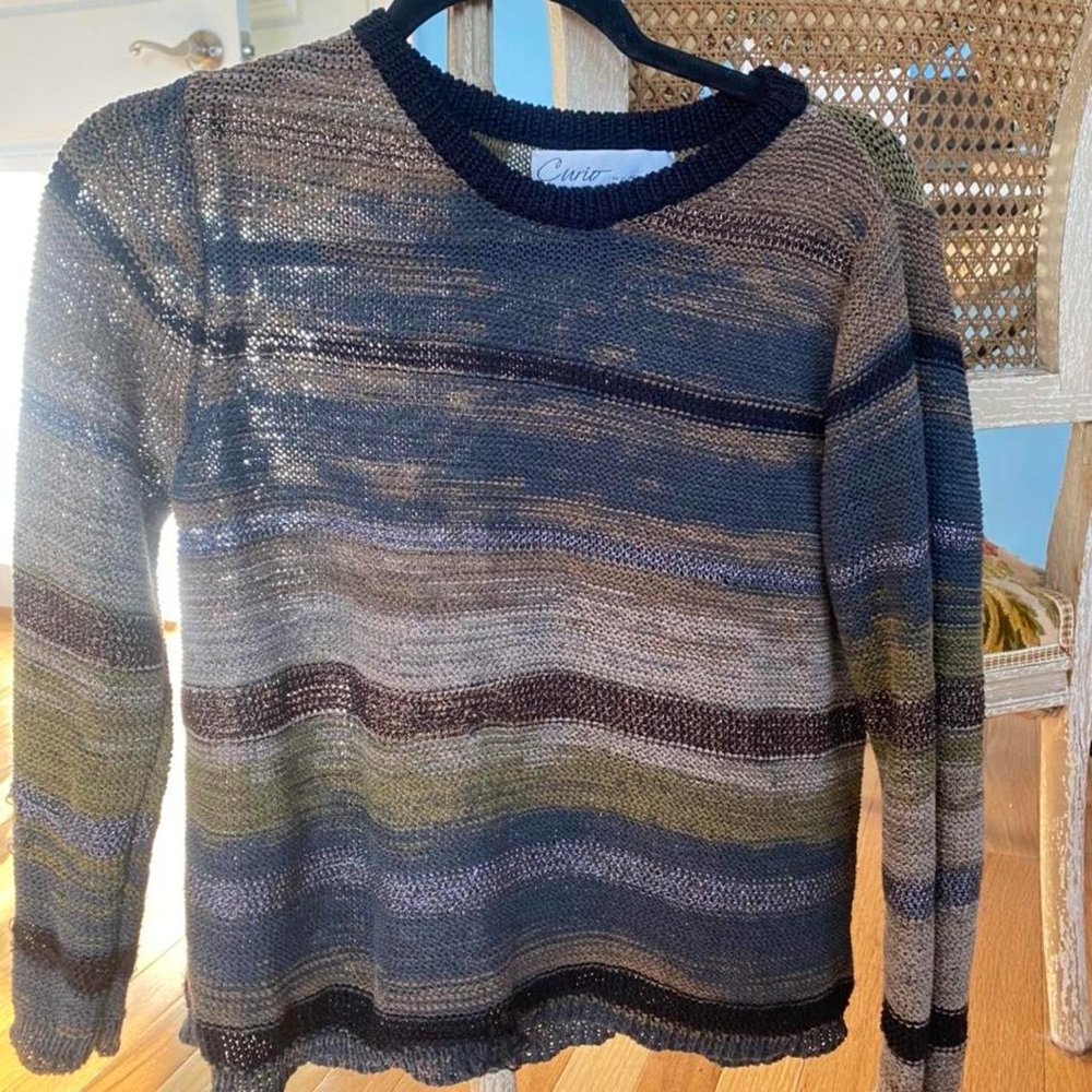 Curio vintage distressed earthy sweater.